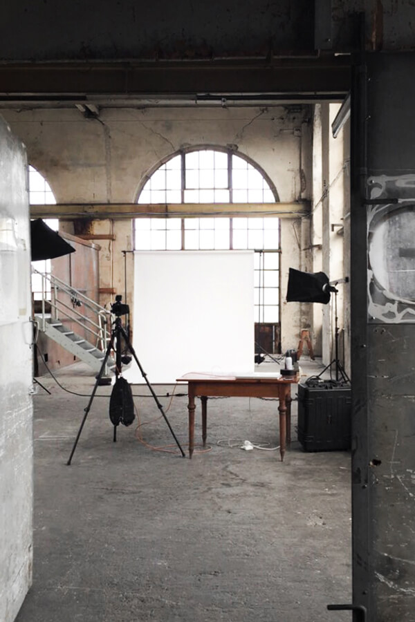 A behind the scene shot from an Interio shoot in an old factory hall.